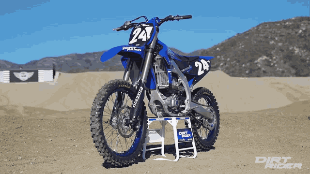 a dirt bike with the number 24 on the front of it