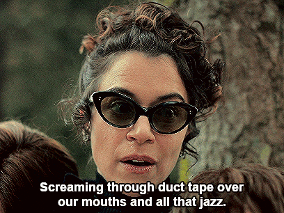 a woman is screaming through duct tape over our mouths and all that jazz