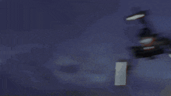 a robot with a purple sword is standing on a mountain