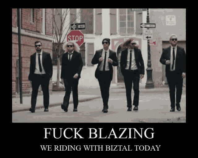 a group of men in suits and ties are walking down a street with the words fuck blazing we riding with biztal today