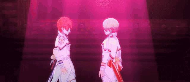 two anime characters are standing next to each other on a stage in front of a red light .