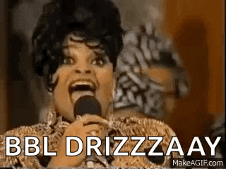 a woman is singing into a microphone with her mouth open and the words `` bbl drizzaay '' .