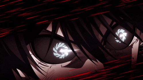 a close up of a person 's eyes with a light coming from them