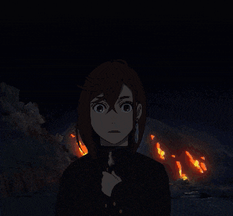 a silhouette of a person looking at an explosion in the background