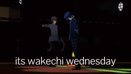 a man in a suit and tie is standing on a stage with the words " its wakechi wednesday " above him