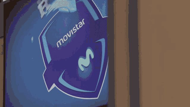 a sign that says movistar on it in blue