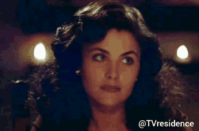 a close up of a woman 's face with the hashtag tvresidence