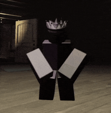 a purple block with a crown on his head