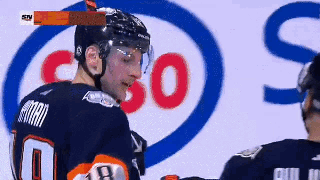 a hockey player wearing a number 10 jersey