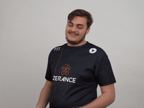 a man wearing a black shirt that says zerance