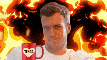 a man holds a red mug that says tenga on it