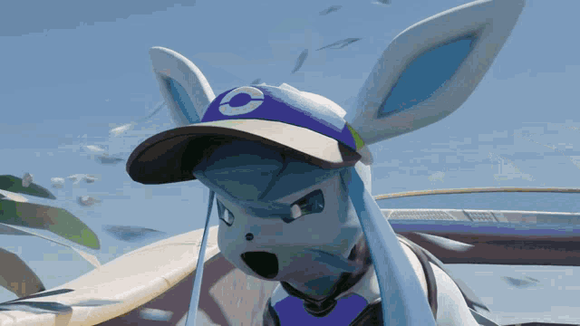 a cartoon rabbit wearing a blue hat with the letter c on it