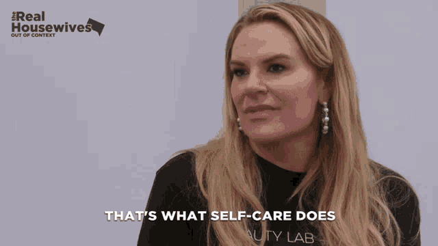 a woman says " that 's what self-care does " while wearing a black shirt