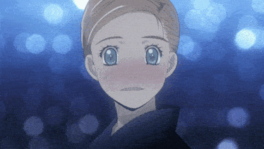 a close up of a girl with blue eyes