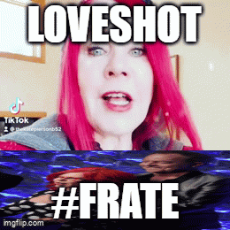 a woman with pink hair says loveshot #frate in front of a blue background