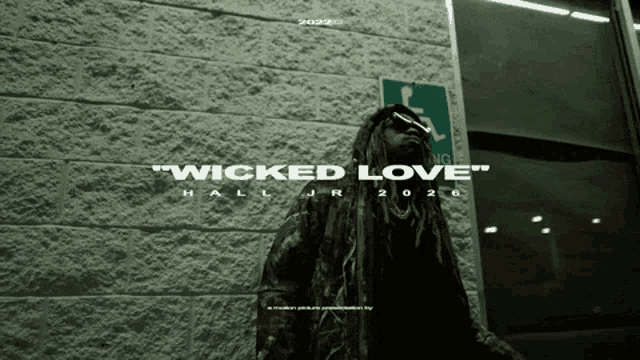 a poster for wicked love hall jr shows a man standing in front of a brick wall