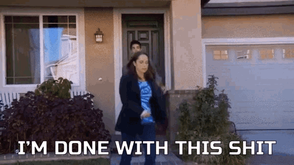 a woman standing in front of a house with the words " i 'm done with this shit " on the bottom