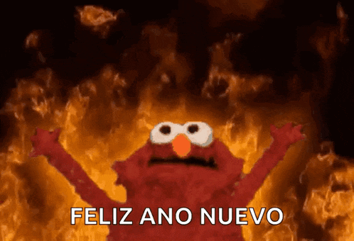 elmo says feliz ano nuevo in front of a fire