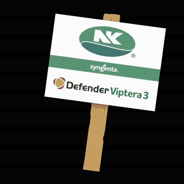 a sign for syngenta defender vipera 3 is attached to a wooden post