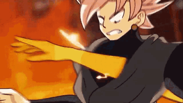 a cartoon character with pink hair and a yellow glove is fighting a fireball .