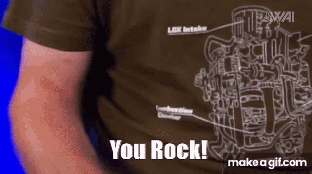 a man wearing a brown shirt that says you rock on it