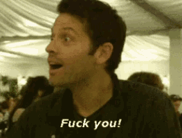 a man with a surprised look on his face is saying fuck you