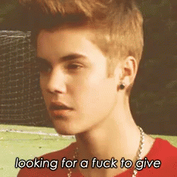 One Sec GIF - Justin Bieber Funny Looking For A Fuck To Give GIFs