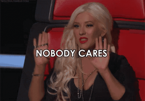 a woman sitting in a chair with the words " nobody cares " on her face