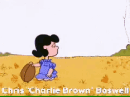 a cartoon of charlie brown and lucy brown playing with a ball