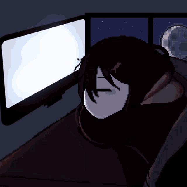 a pixel art drawing of a person laying in front of a computer screen