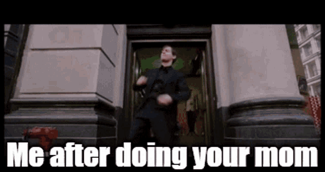 a man in a suit is dancing in front of a building with the words me after doing your mom written below him
