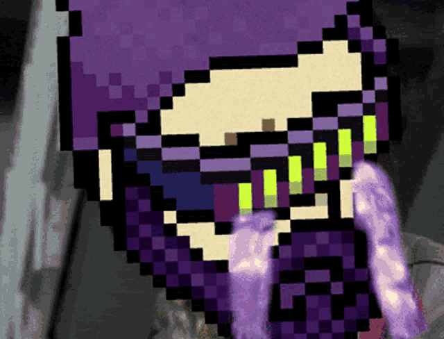 a pixel art drawing of a person with purple hair and glasses