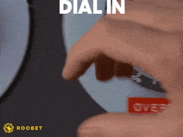 a person is pressing a button that says dial in over