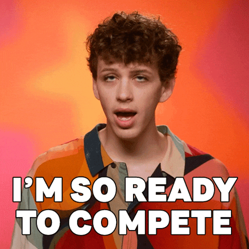 a young man with curly hair is ready to compete