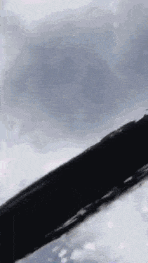 a close up of a brush stroke on a white surface .