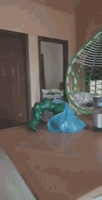 a white refrigerator is in a kitchen next to a green toy