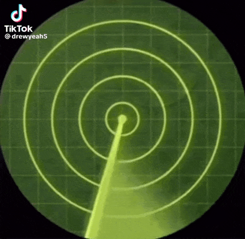 a radar screen shows a circle with a yellow arrow pointing to it .