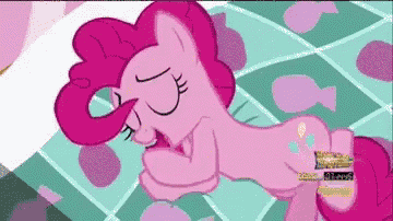 pinkie pie from my little pony sleeping on a bed