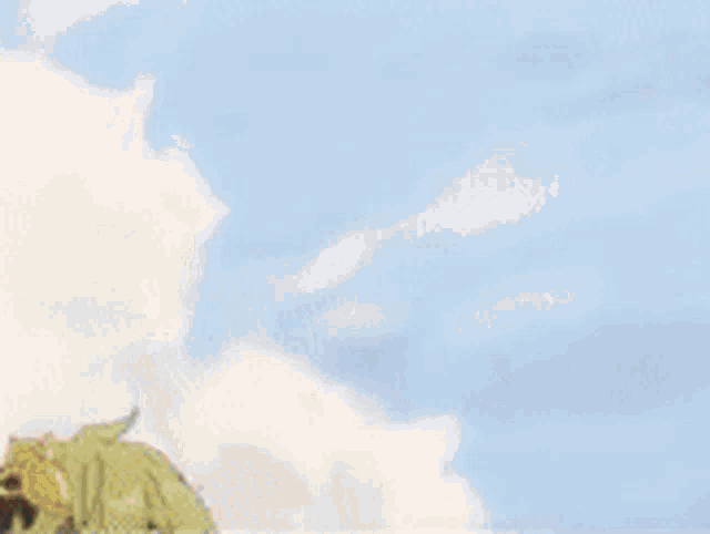 a cartoon character with green hair and blue eyes is standing in front of a blue sky with his hand in the air .