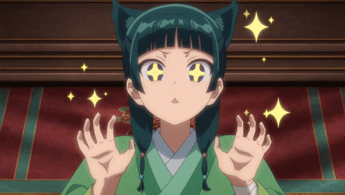 a girl with cat ears and a star in her eyes is making a face