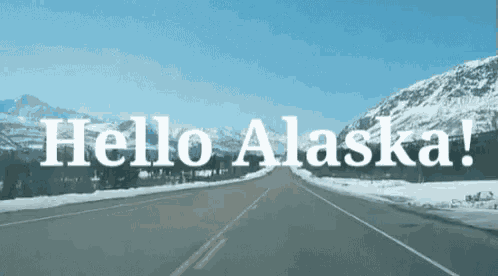 a road with mountains in the background and the words hello alaska