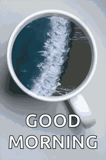 a cup of coffee with the words " good morning " on the bottom