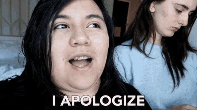 a woman with braces says i apologize in front of her
