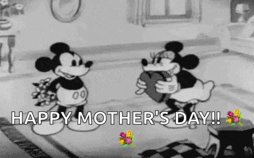 a black and white cartoon of mickey mouse and minnie mouse standing next to each other in a living room .