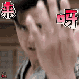 a man is making a funny face with his hands in front of him .