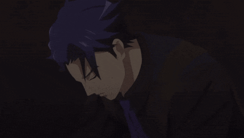 a man with purple hair is wearing a black shirt and tie