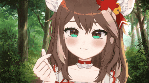 a girl with brown hair and green eyes is giving a thumbs up sign