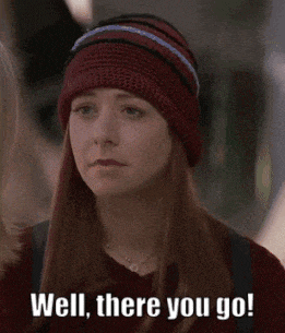 a woman wearing a red beanie says well there you go .