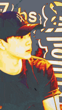 a man wearing a hat that says ' bs ' on it