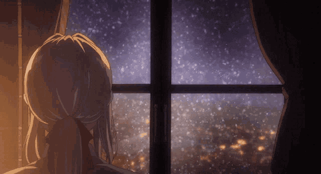 a woman is looking out a window at a starry night sky